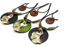Load image into Gallery viewer, Vintage Ethnic Style Wooden Necklace Large Leaf Round Pendant Sweater Chain
